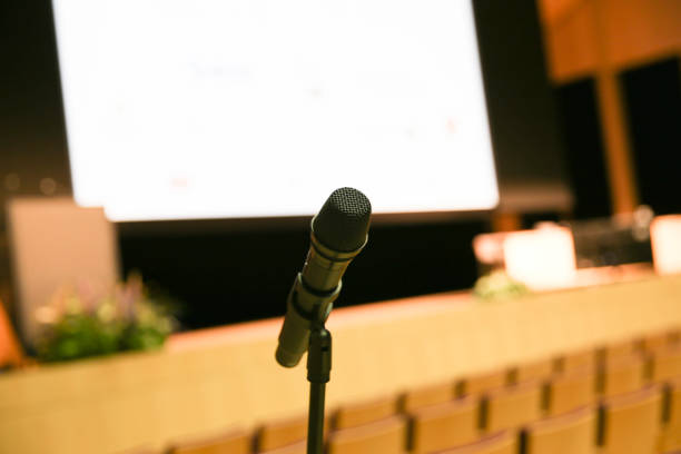 istock Microphone in concert hall or conference room 1213521698