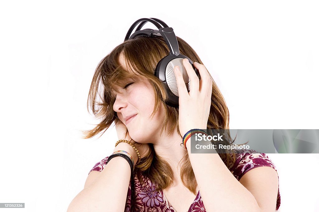 Adolescente Litsening a música com fones de ouvido - Foto de stock de Fone de Ouvido - Equipamento de som royalty-free