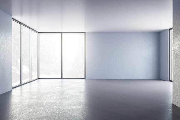 istock Minimalistic interior room with blank concrete wall 1213523401