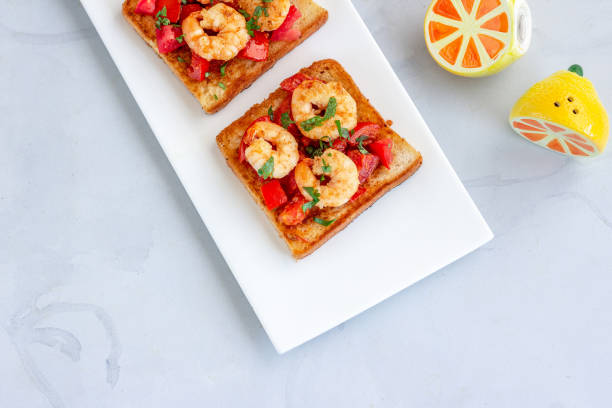 Shrimp Toast on a White Platter on White Background Directly Above Horizontal Stock Photo