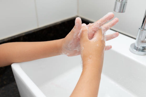 istock Coronavirus prevention. Child washing hands. Hygiene. Covid-19 1213523770