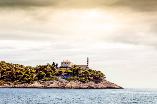 sunset over a lighthouse in Croatia