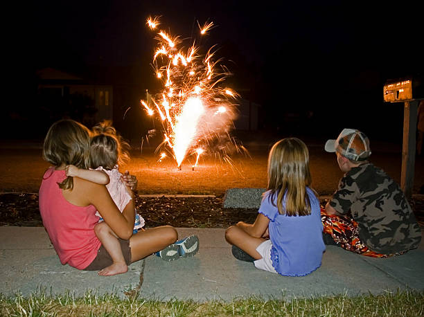 istock Kids Watching Fireworks at Home 121352424