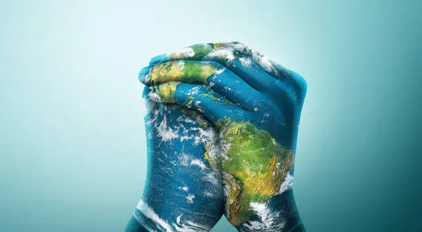 Photo of Green Planet in Your Hands. Save Earth