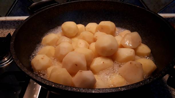 istock Ripe potatoes and fresh strawberries 1213525356