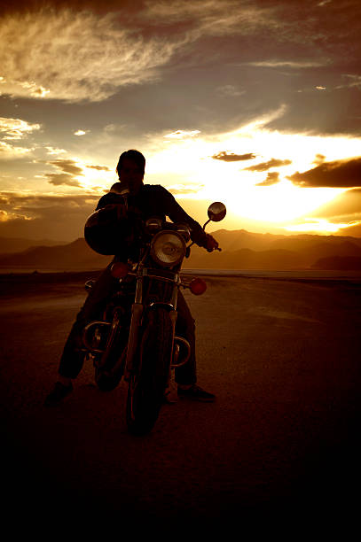 istock Silhouette of man on his motorcycle 121352537