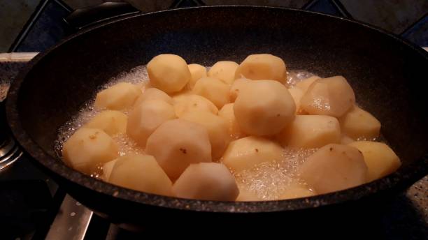 istock Ripe potatoes and fresh strawberries 1213525406