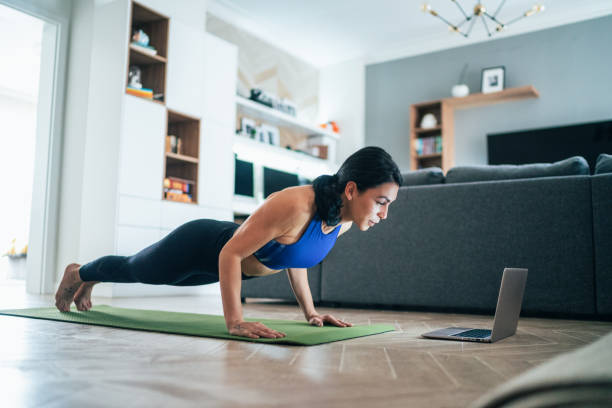 istock Sporty woman doing plank 1213527577