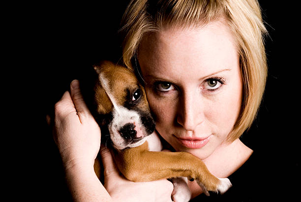 istock Woman with her puppy 121352780