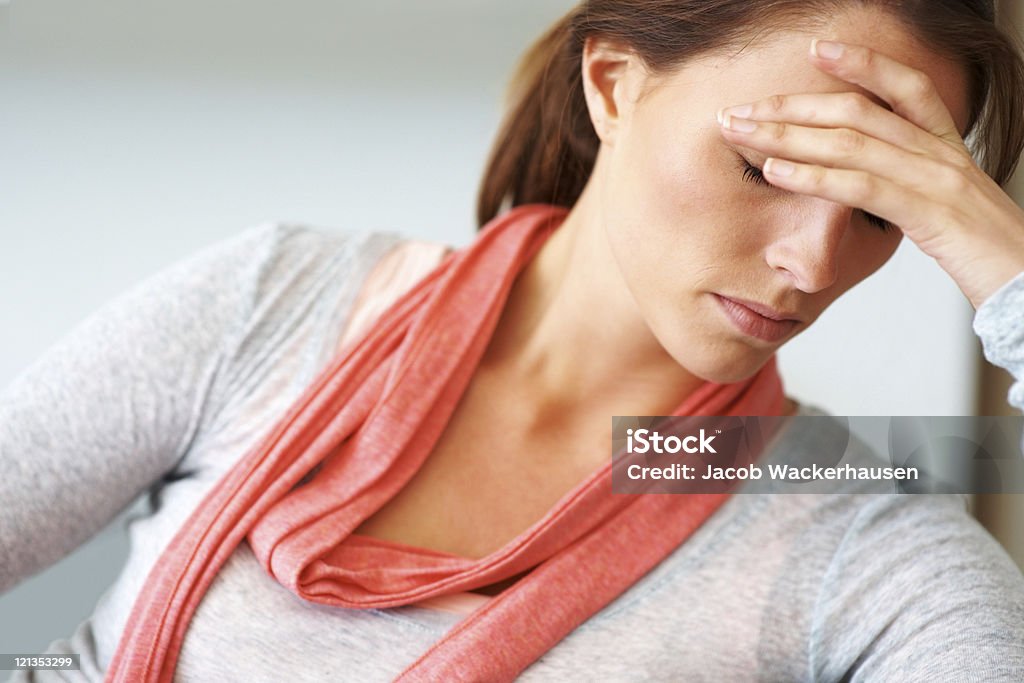 Beautiful young woman looking depressed  20-29 Years Stock Photo