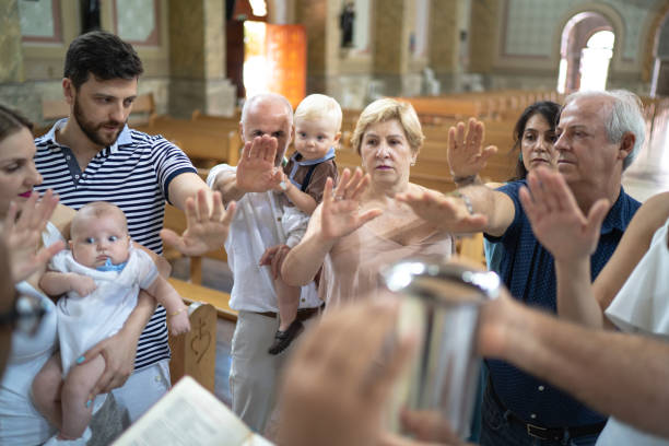 istock Family praying at church 1213534882