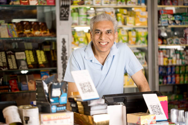 istock Male owner at supermarket 1213534929