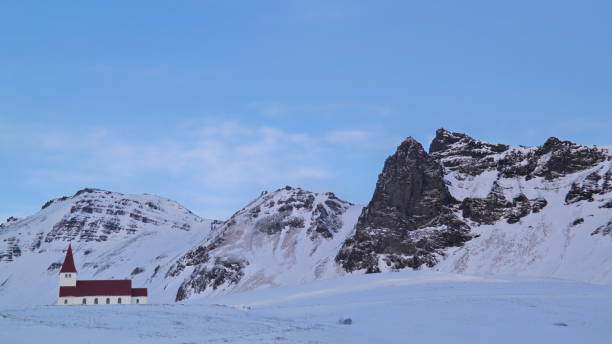 istock Church on white snow field 1213535100