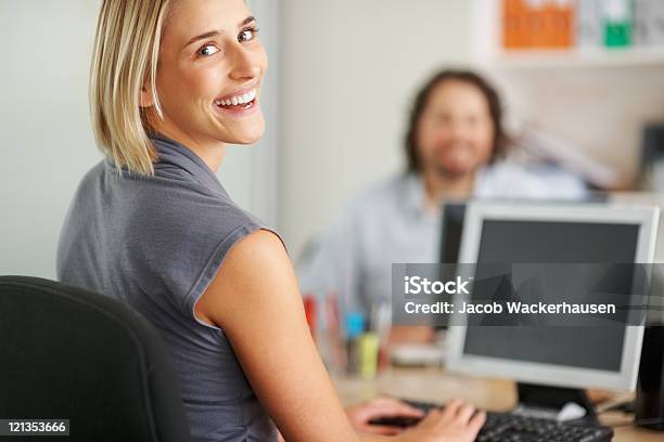 Young Woman Working On Computer Stock Photo - Download Image Now - Adult, Adults Only, Business