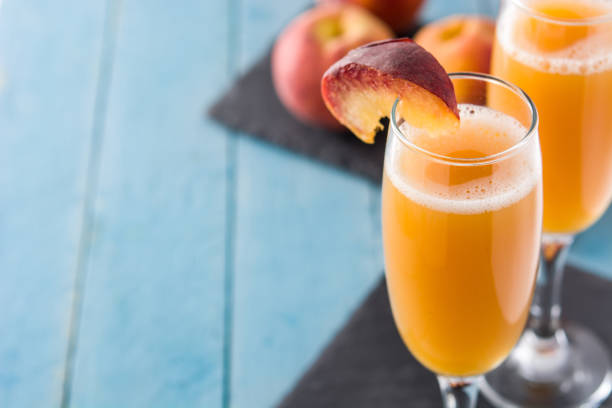istock Bellini champagne cocktail in crystal glass 1213539318
