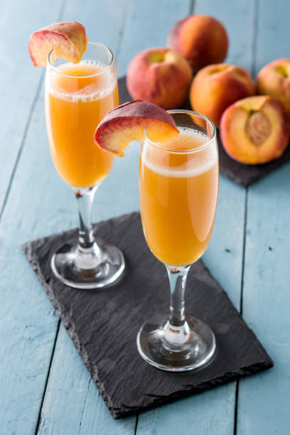 istock Bellini champagne cocktail in crystal glass 1213539571