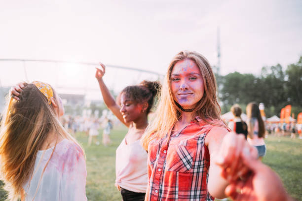 istock Dancing people at summer holi festival 1213540642