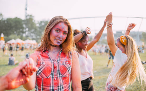 istock Dancing people at summer holi festival 1213540672
