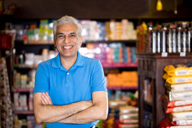istock Happy man at grocery store 1213541468