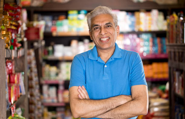 istock Happy man at grocery store 1213541505