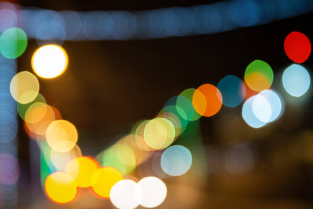 istock Warm color bokeh large circles of light scattered celebration atmosphere 1213544035