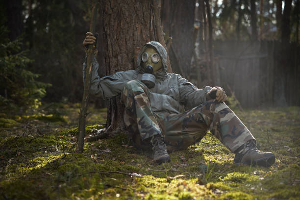 istock man in a gas mask protects himself from coronavirus 1213545216