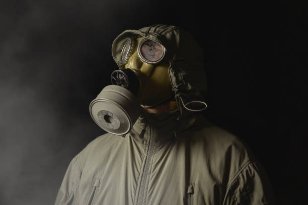 istock man in a gas mask protects himself from coronavirus 1213545233