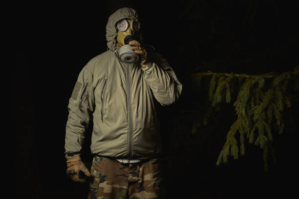 istock man in a gas mask protects himself from coronavirus 1213545250