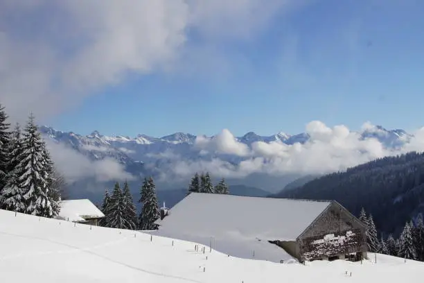 Winter landscape in the Allgäu Alps with hut