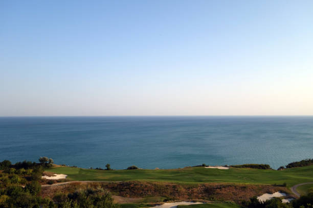 Golf fields and Black sea resort. Seasonal natural background.