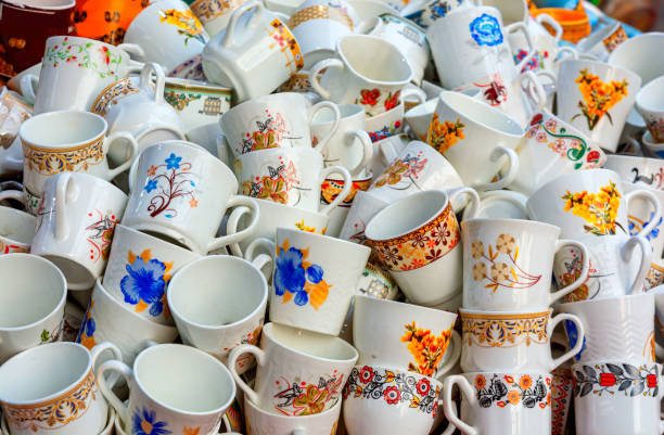 istock Traditional colorful ceramic cups are displayed for sale. 1213545952
