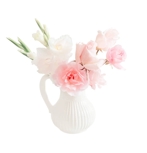 istock pink and white flowers in vase isolated on white background 1213548394