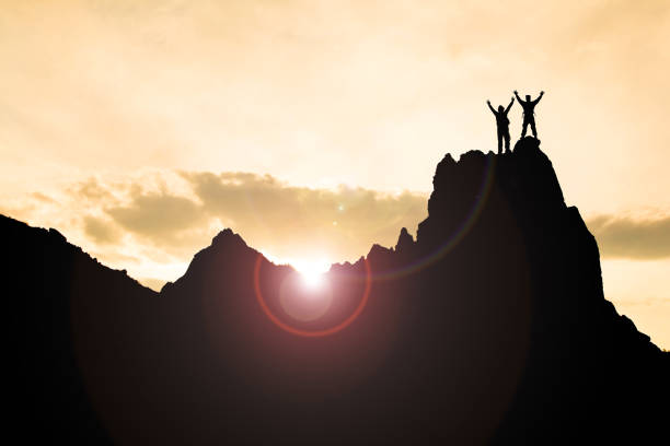 istock successful and determined people at the summit 1213550628