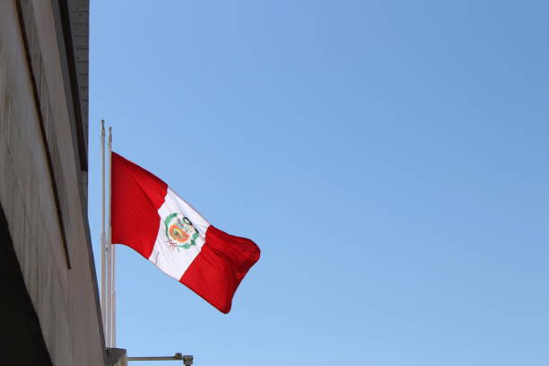 istock Flag of Peru with blue sky 1213551009