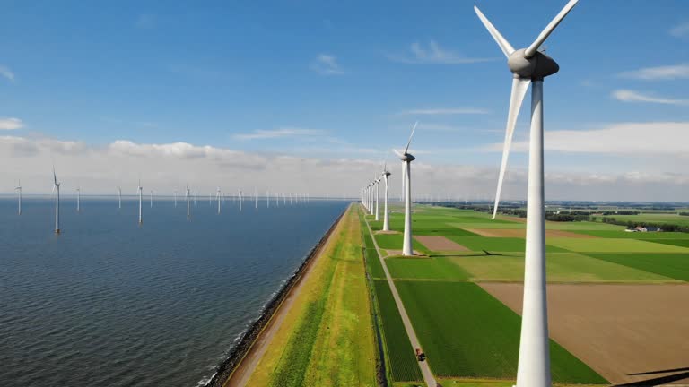 Wind turbine from aerial view, Drone view at windpark westermeerdijk a windmill farm in the lake IJsselmeer the biggest in the Netherlands,Sustainable development, renewable energy