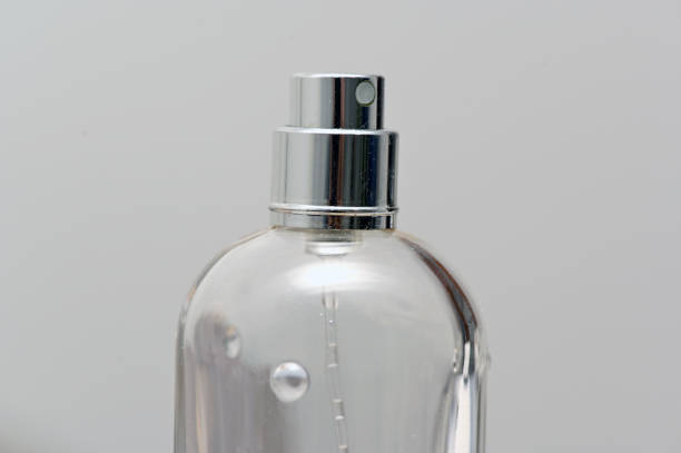 istock Close up to empty bottle of parfume spray. 1213555707