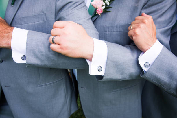 istock Groomsmen show off cufflinks 1213557260