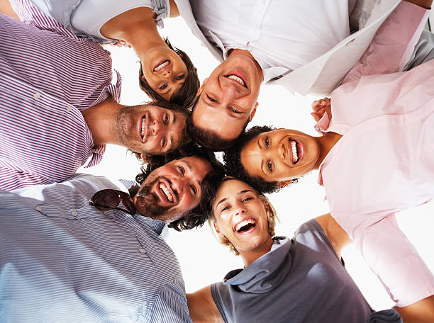 istock Business people huddled together 121355816