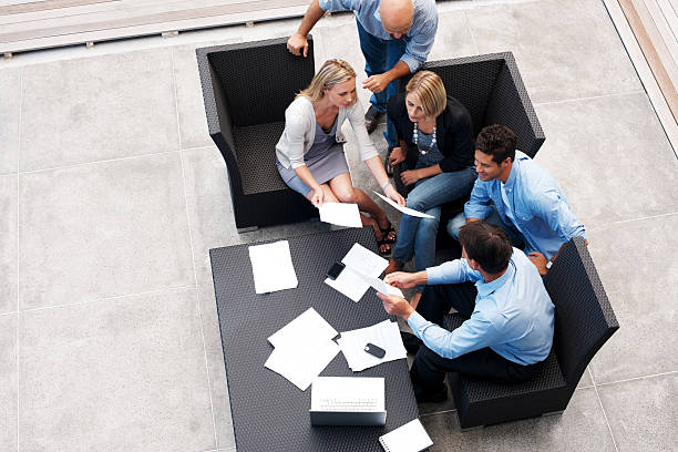 istock Businesspeople working together on a new project 121356151