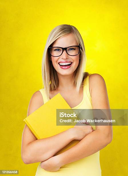 Happy Young Student Holding Book Stock Photo - Download Image Now - 20-29 Years, Adult, Adults Only