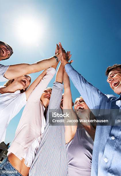 Joyful Business People Together Celebrating Their Success Stock Photo - Download Image Now