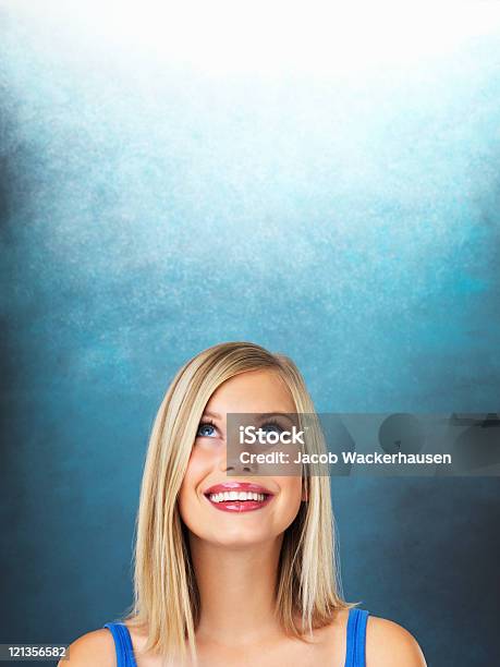 Thinking About The Possibilities Stock Photo - Download Image Now - Looking Up, One Woman Only, Women