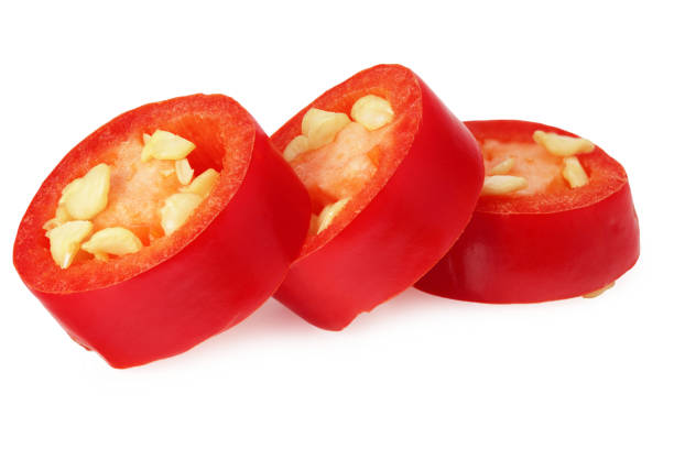 istock sliced red hot chili peppers isolated on white background 1213566581