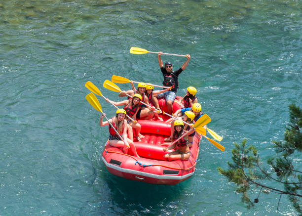 istock Group of people white water rafting 1213567270