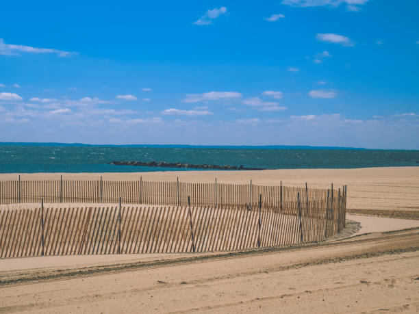 istock Empty beach and fence 1213567750