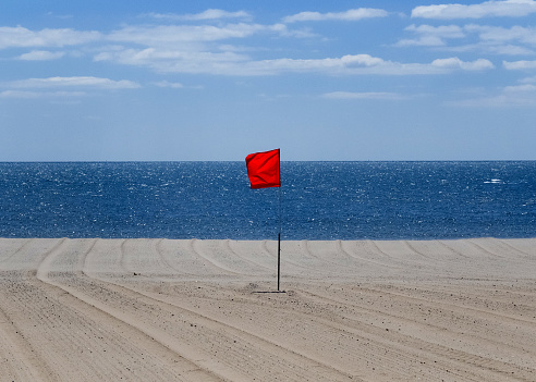 Red flag on the beach