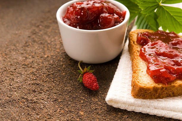istock Wild strawberry jam with toast 121356942