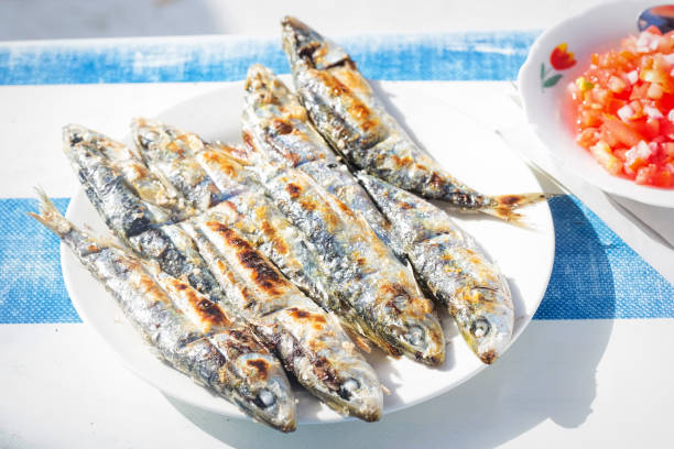 istock Grilled sardines with moroccan tomato salad 1213570000