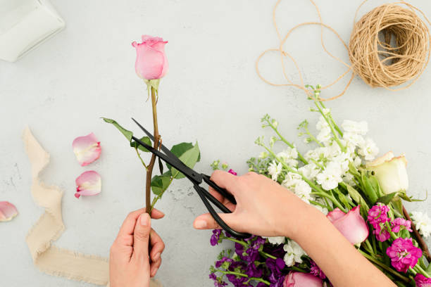 istock Flower flat lay arrangement over stone table 1213573633
