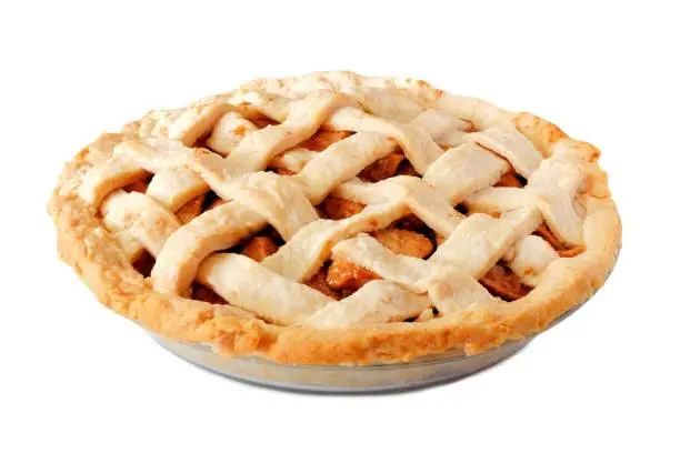 Photo of Homemade apple pie with lattice pastry, side view isolated on white